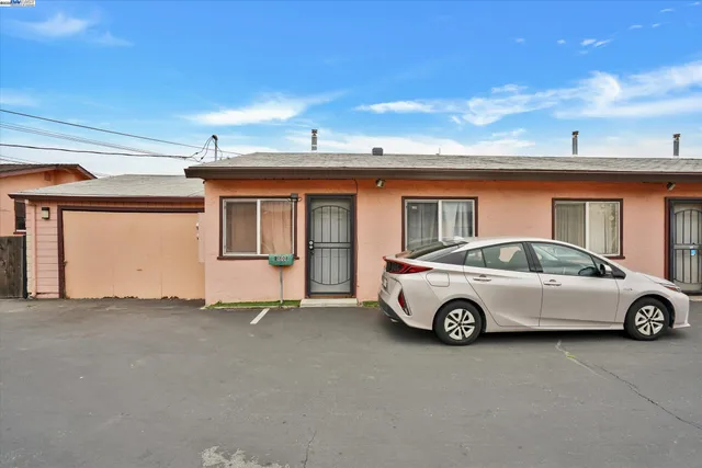 a car parked in front of a house