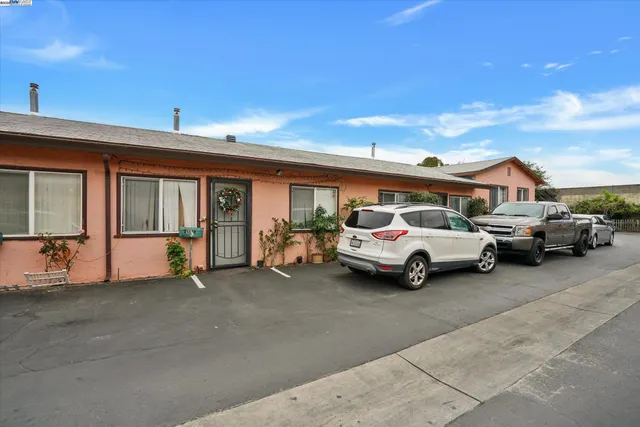 a view of a cars park in front of house