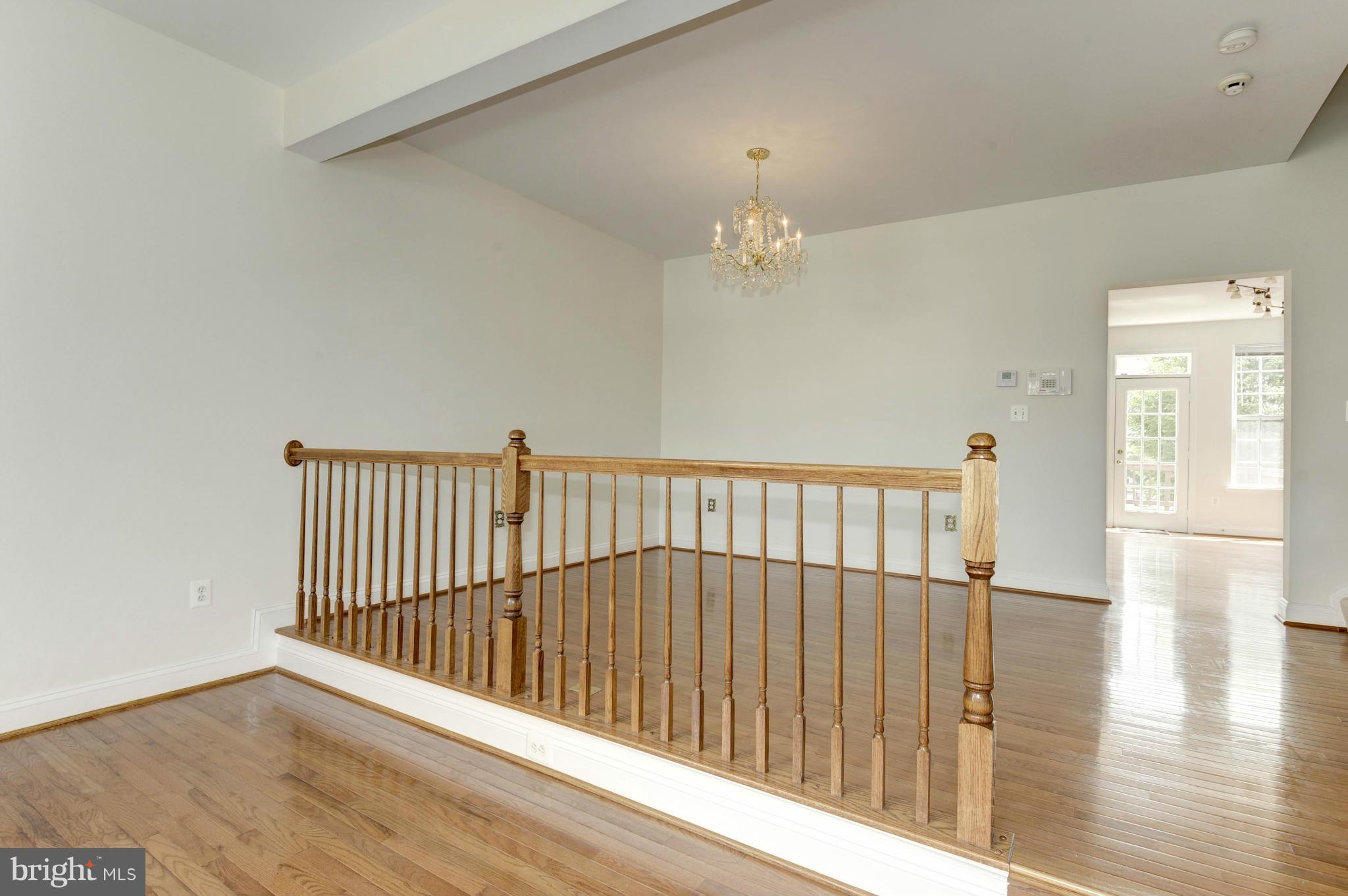 665 Springhouse Square Southeast Leesburg, VA 20175 - Photo 4 of 30 Dining Room w/step down to living room
