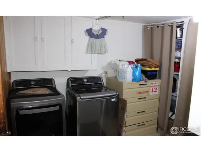 a kitchen with a stove and a refrigerator