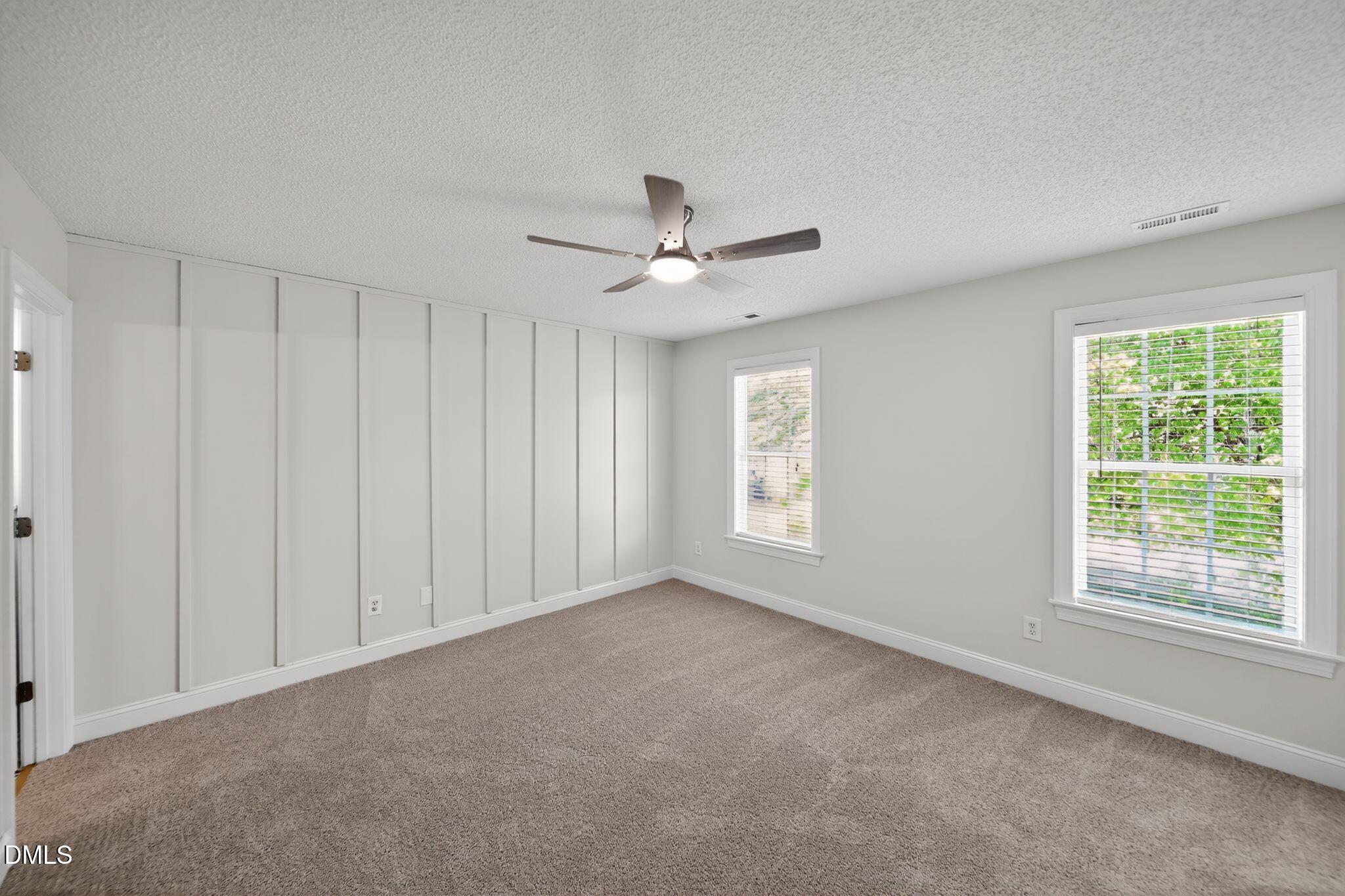 641 Commander Drive Wendell, NC 27591 - Photo 10 of 15 a view of a livingroom with a ceiling fan and window