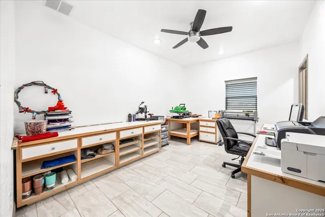 a view of a yard with a tree