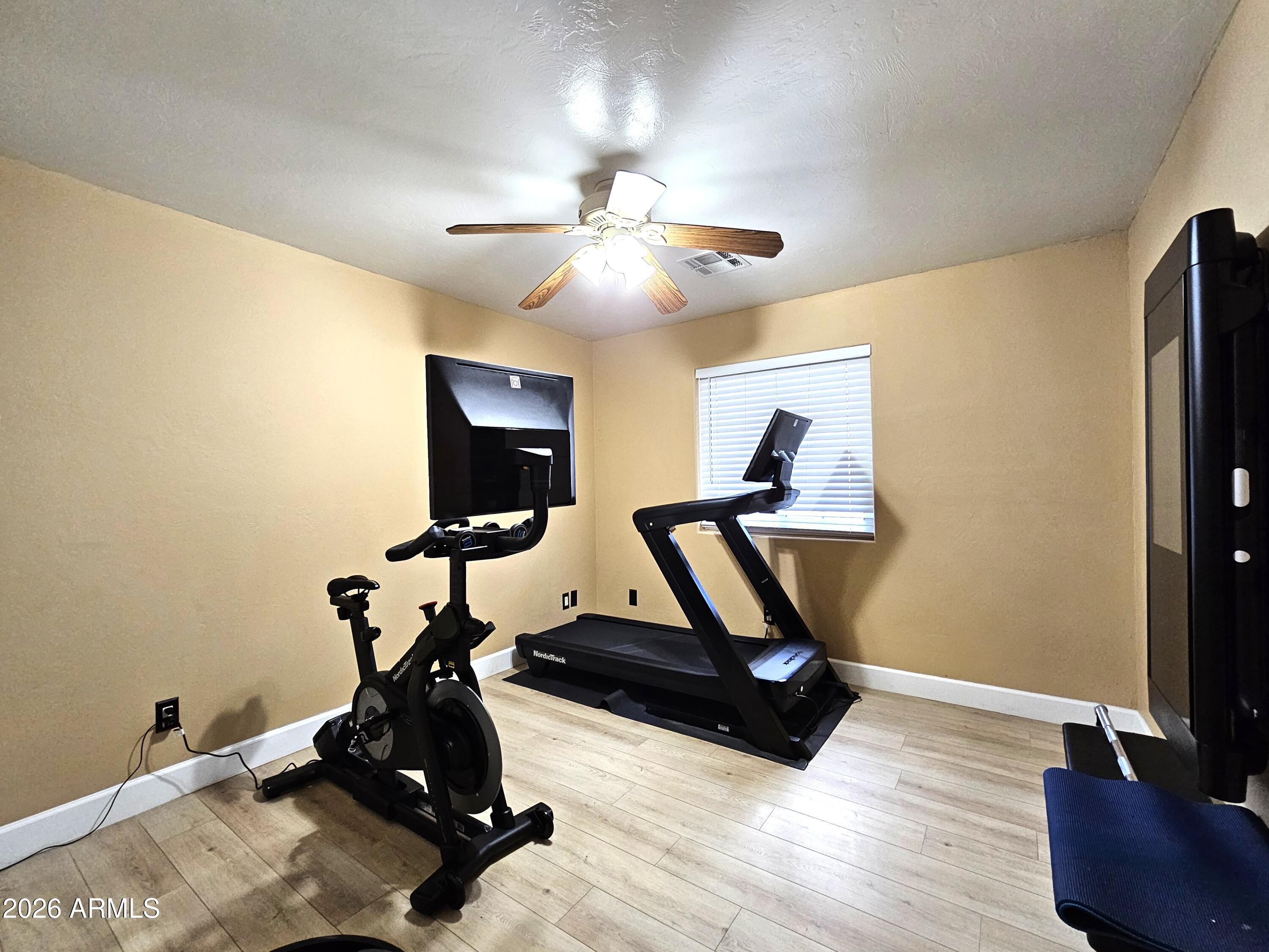 5705 South Wild Rose Road Hereford, AZ 85615 - Photo 23 of 39 a view of a room with gym equipment