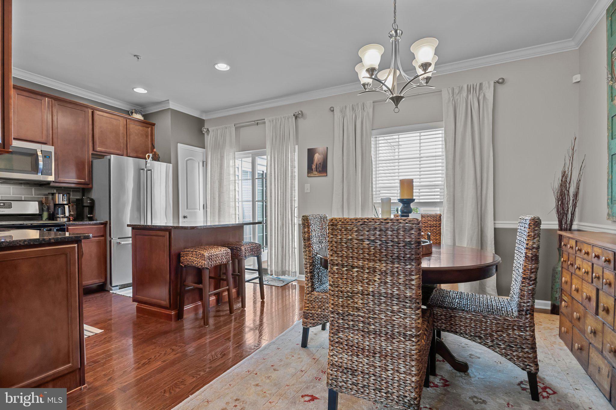 3799 Jacob Stout Road, Unit 9 Doylestown, PA 18902 - Photo 11 of 42 a view of a livingroom with furniture window and wooden floor