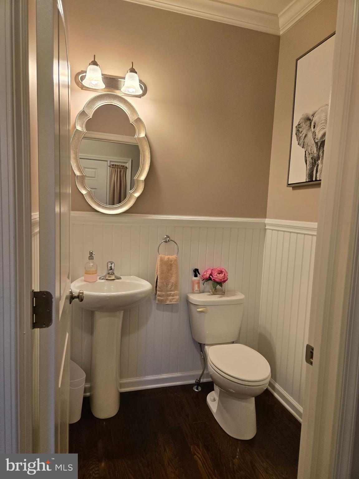 3799 Jacob Stout Road, Unit 9 Doylestown, PA 18902 - Photo 16 of 42 a white toilet sitting next to a bathroom sink
