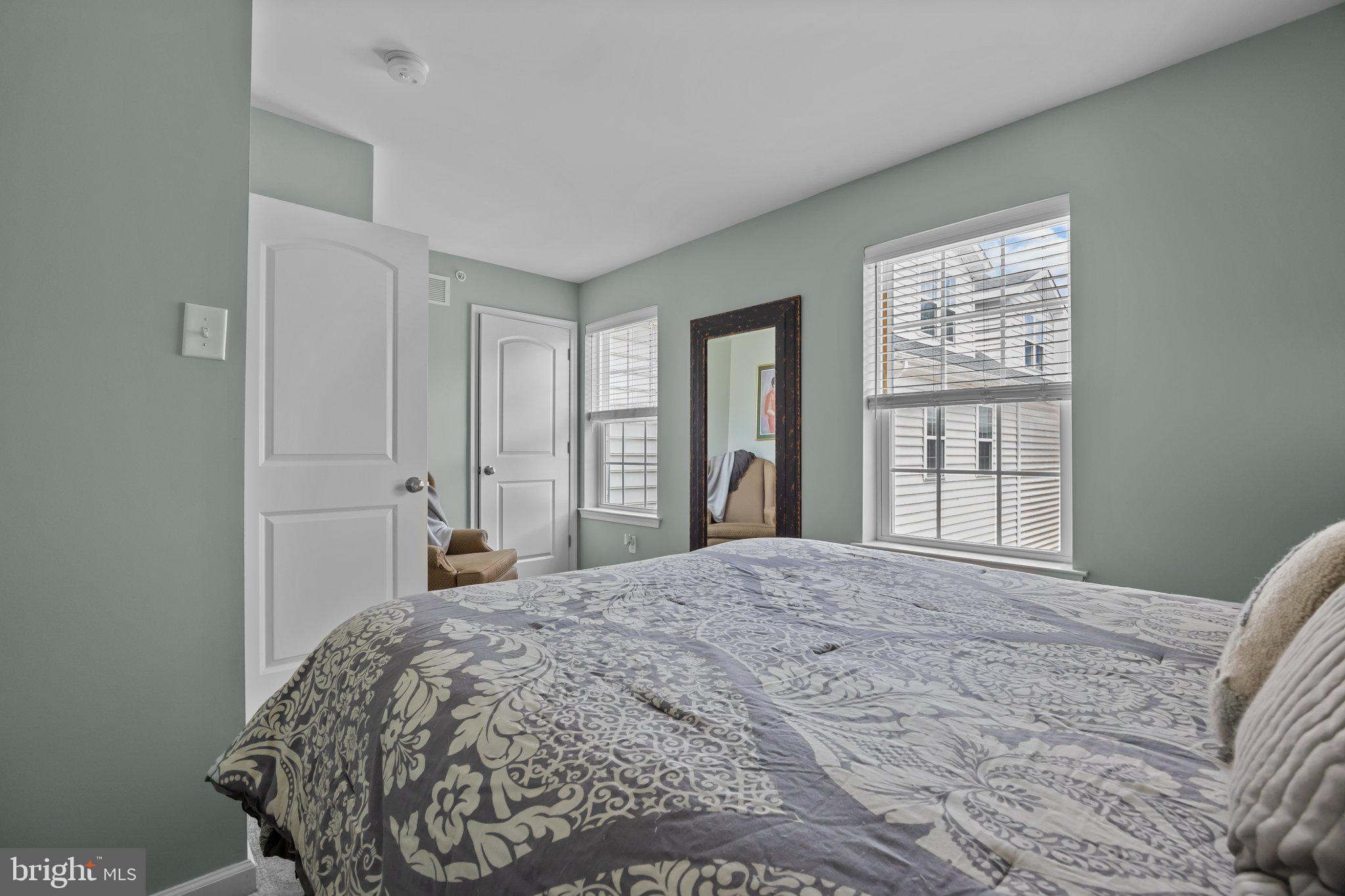 3799 Jacob Stout Road, Unit 9 Doylestown, PA 18902 - Photo 25 of 42 a bedroom with a bed and a window