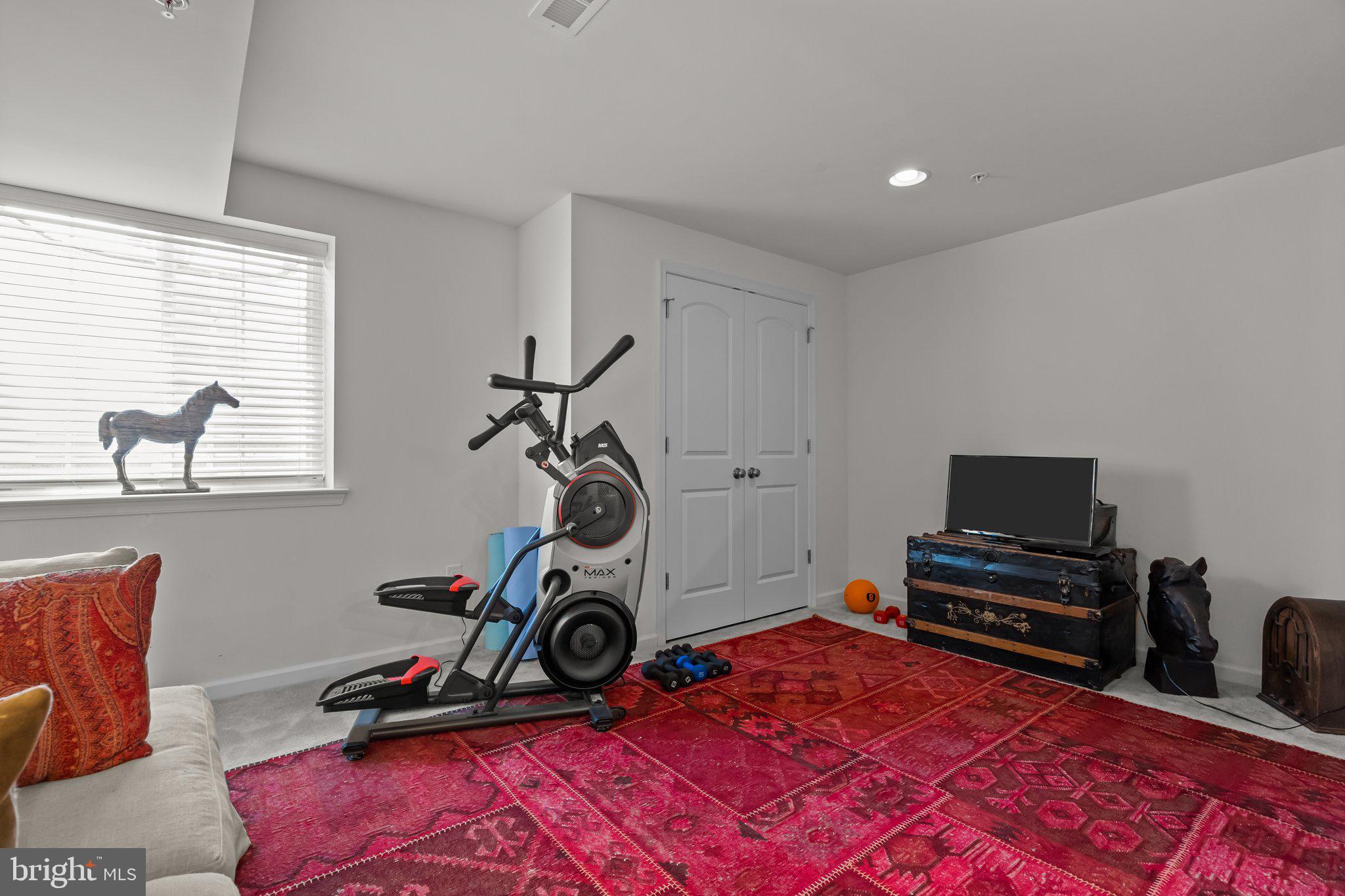 3799 Jacob Stout Road, Unit 9 Doylestown, PA 18902 - Photo 29 of 42 a view of a room with gym equipment
