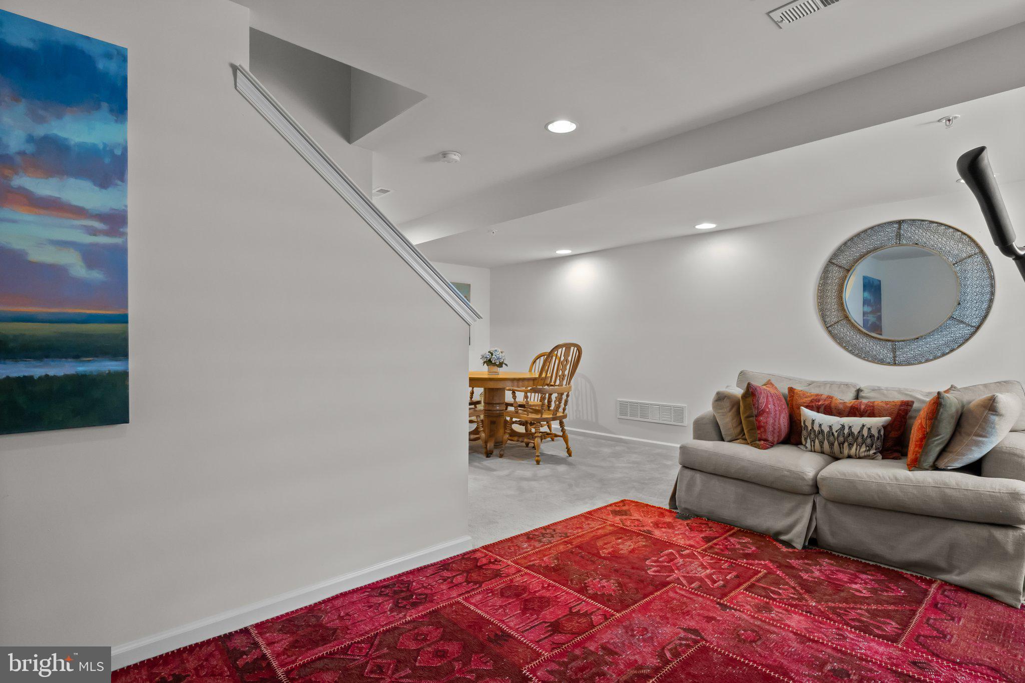 3799 Jacob Stout Road, Unit 9 Doylestown, PA 18902 - Photo 30 of 42 a living room with furniture and a rug