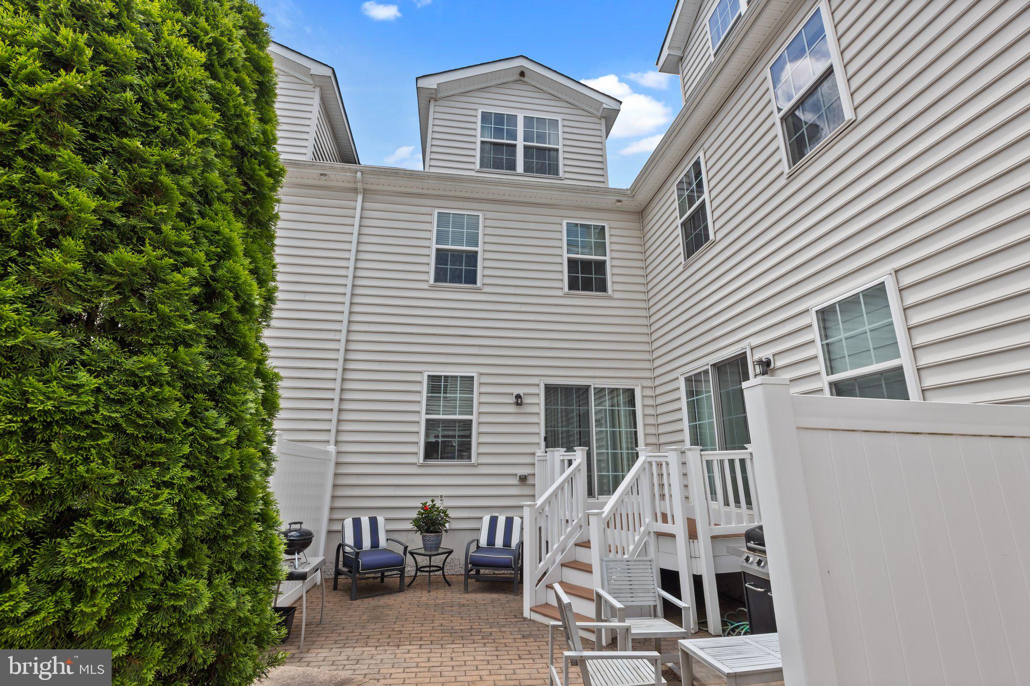 3799 Jacob Stout Road, Unit 9 Doylestown, PA 18902 - Photo 36 of 42 a view of a house with a patio