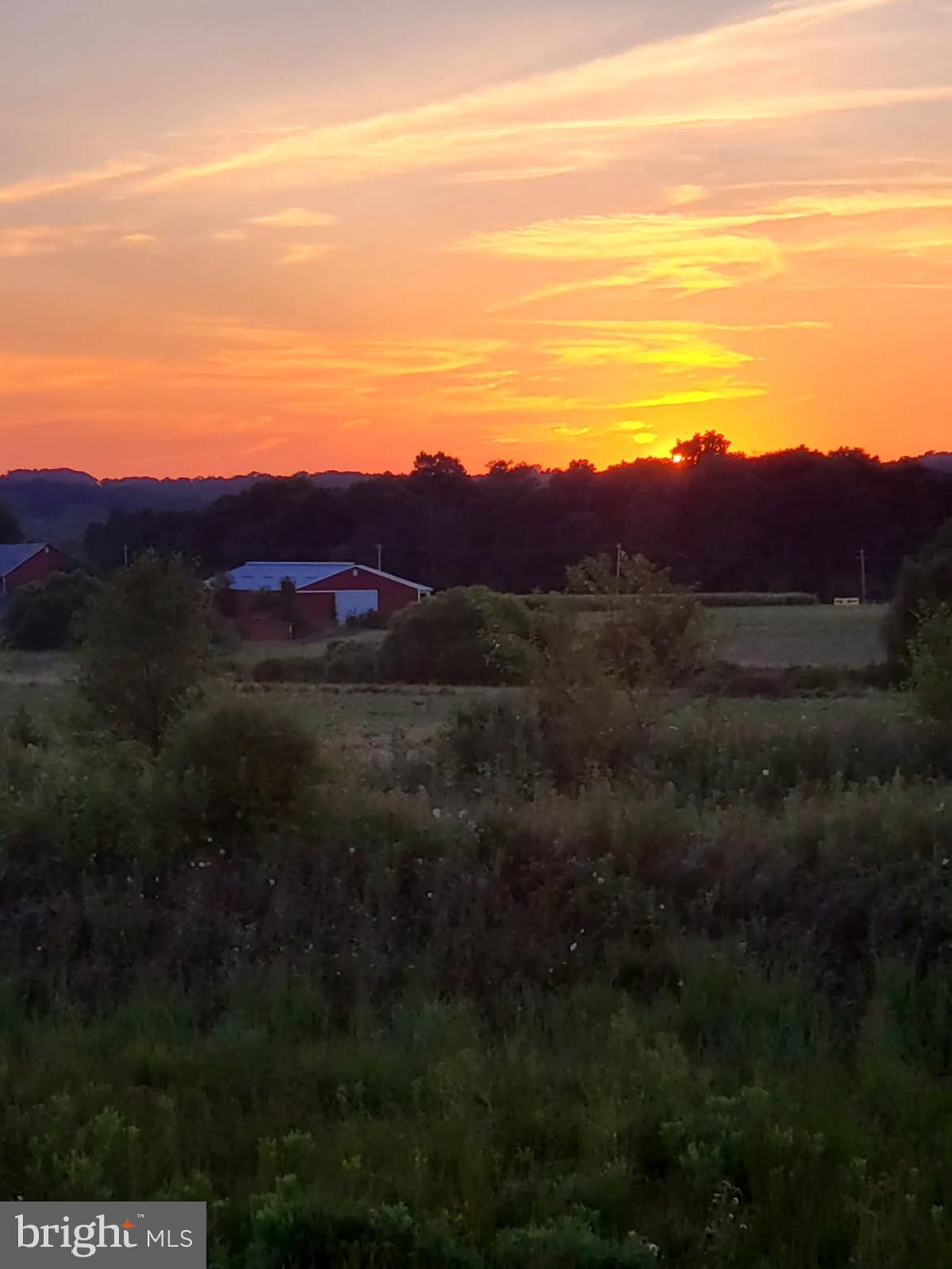 3799 Jacob Stout Road, Unit 9 Doylestown, PA 18902 - Photo 41 of 42 a view of an mountain and sunset