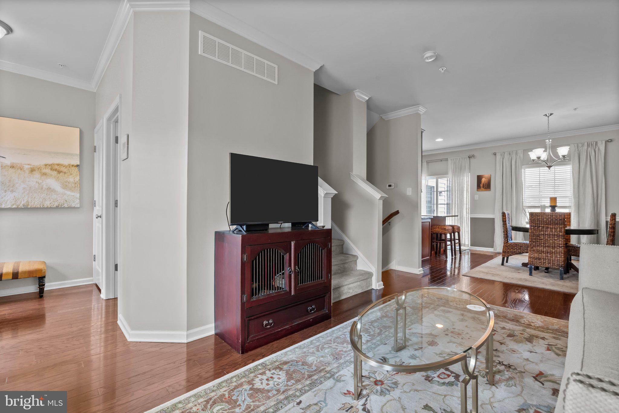 3799 Jacob Stout Road, Unit 9 Doylestown, PA 18902 - Photo 7 of 42 a living room with furniture and a flat screen tv