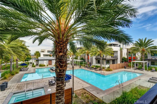 a view of a two chairs in the balcony
