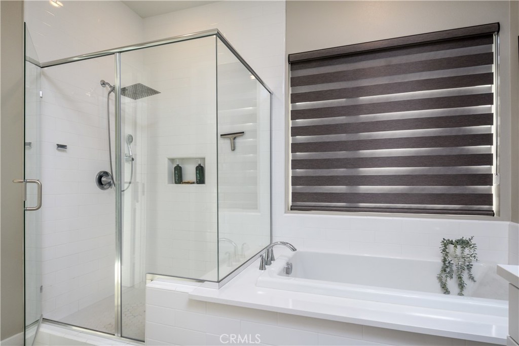 413 Transport Tustin, CA 92782 - Photo 20 of 47 a bathroom with a shower and a sink