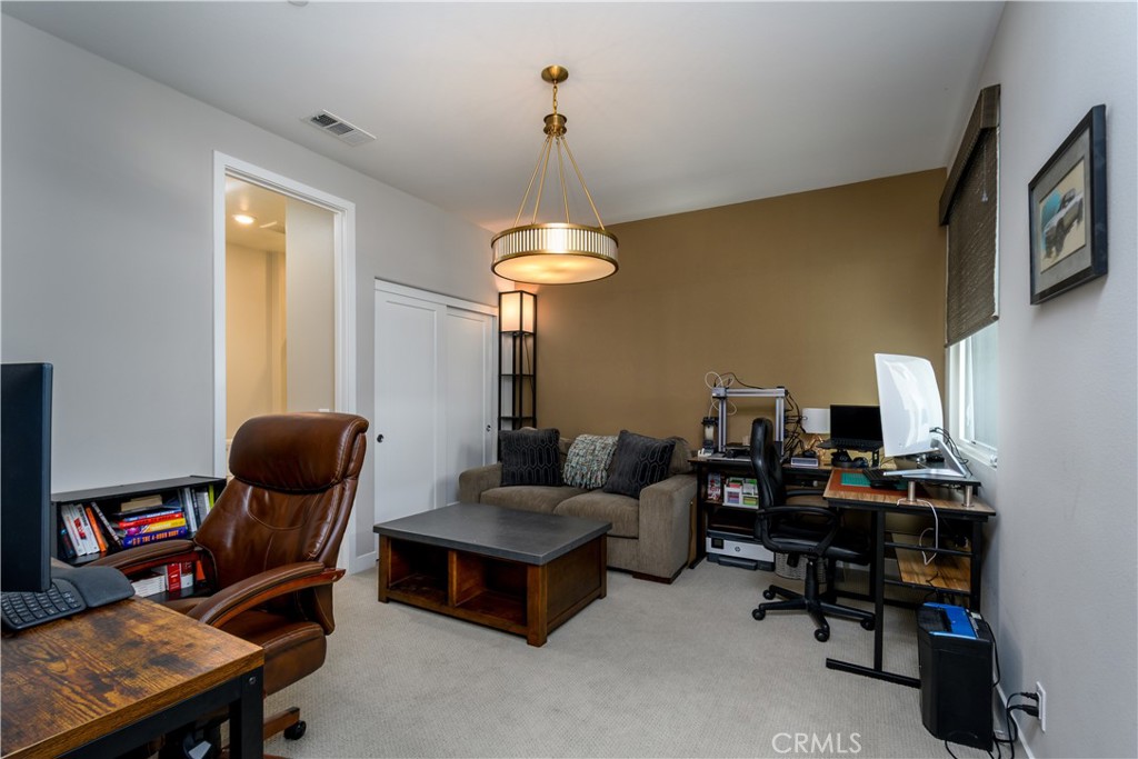 413 Transport Tustin, CA 92782 - Photo 27 of 49 a living room with furniture and a window