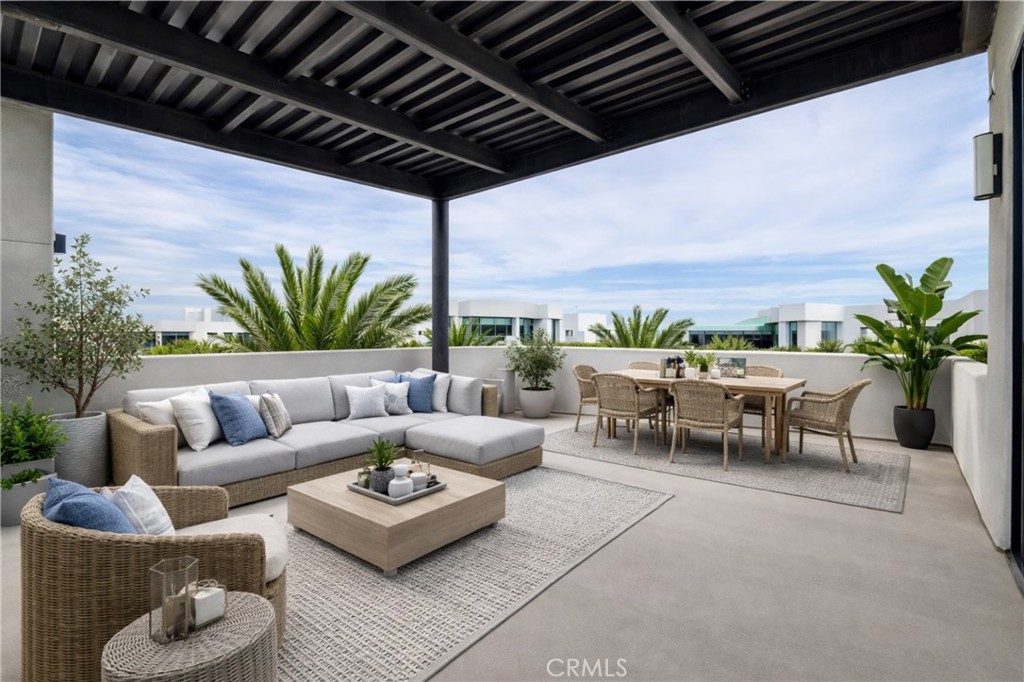 413 Transport Tustin, CA 92782 - Photo 3 of 49 a patio with patio couch and potted plants