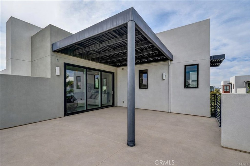 413 Transport Tustin, CA 92782 - Photo 35 of 49 a view of a big room with wooden floor and windows