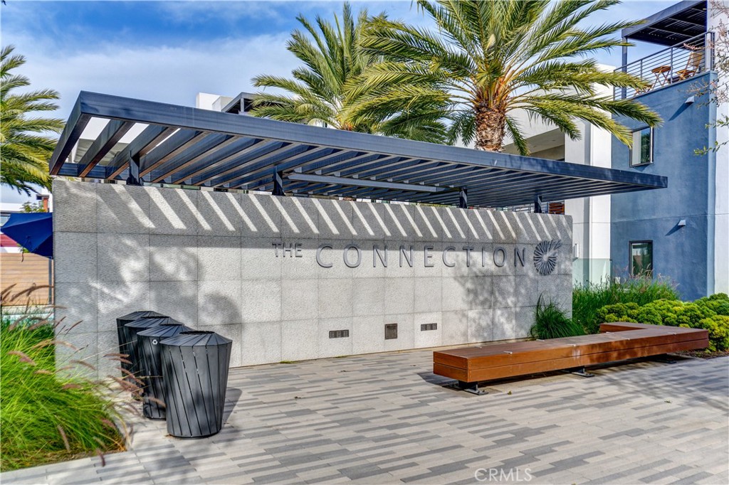 413 Transport Tustin, CA 92782 - Photo 45 of 47 a backyard of a house with barbeque oven table and chairs