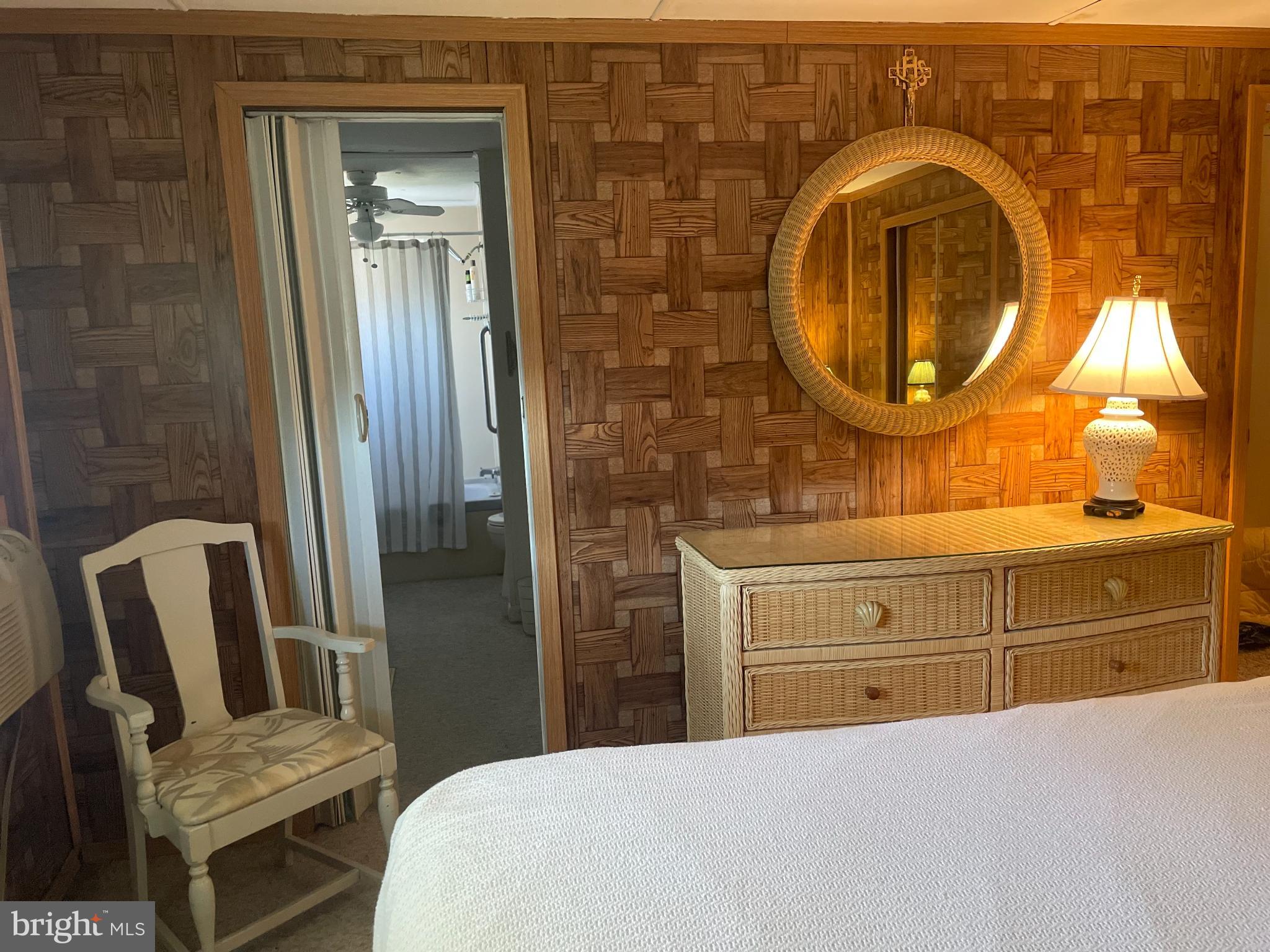 131-25 Priest Boulevard Rio Grande, NJ 08242 - Photo 20 of 35 a bathroom with a sink and a mirror