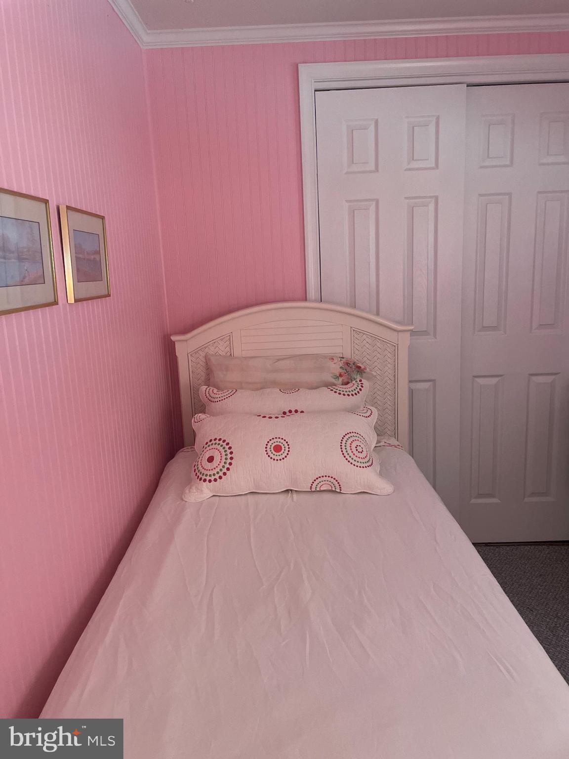 131-25 Priest Boulevard Rio Grande, NJ 08242 - Photo 28 of 35 a bedroom with a bed and a cabinets