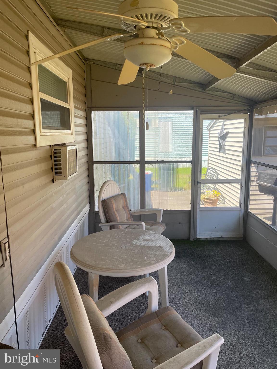 131-25 Priest Boulevard Rio Grande, NJ 08242 - Photo 30 of 35 a view of a dining room with furniture window and outside view