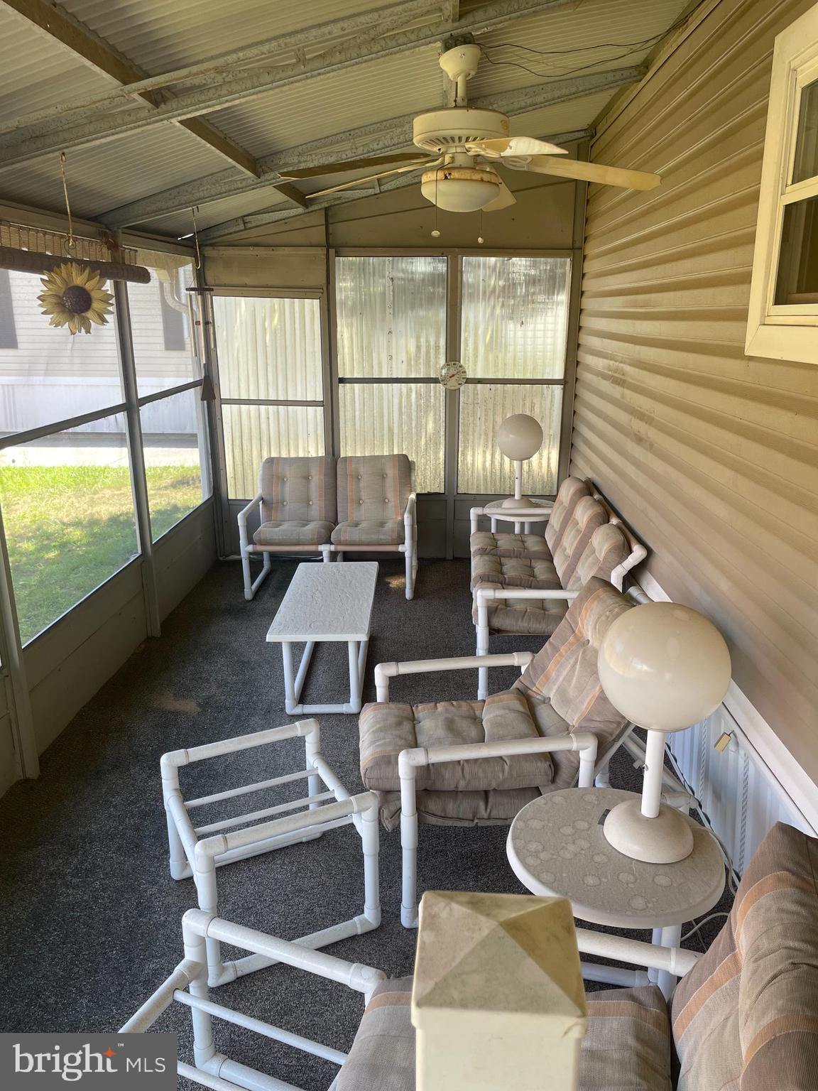 131-25 Priest Boulevard Rio Grande, NJ 08242 - Photo 31 of 35 a living room with furniture and a wooden floor