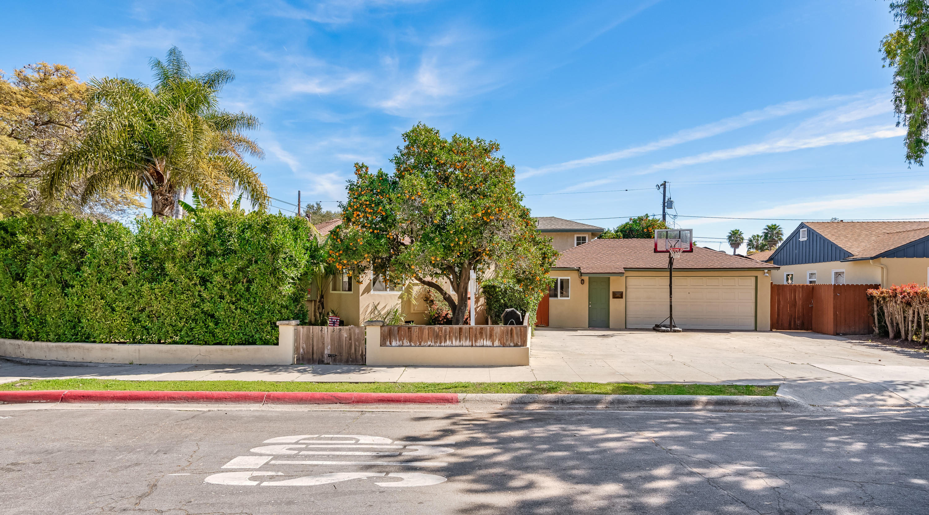 2139 Modoc Road Santa Barbara, CA 93101 - Photo 2 of 19 Street view & hedge on Modoc