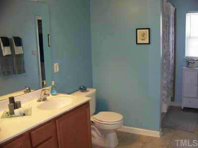 423 Hanson Road Durham, NC 27713 - Photo 6 of 12 The double sink and cabinets offer plenty of space and upgraded tile surround in shower is impressive. Other