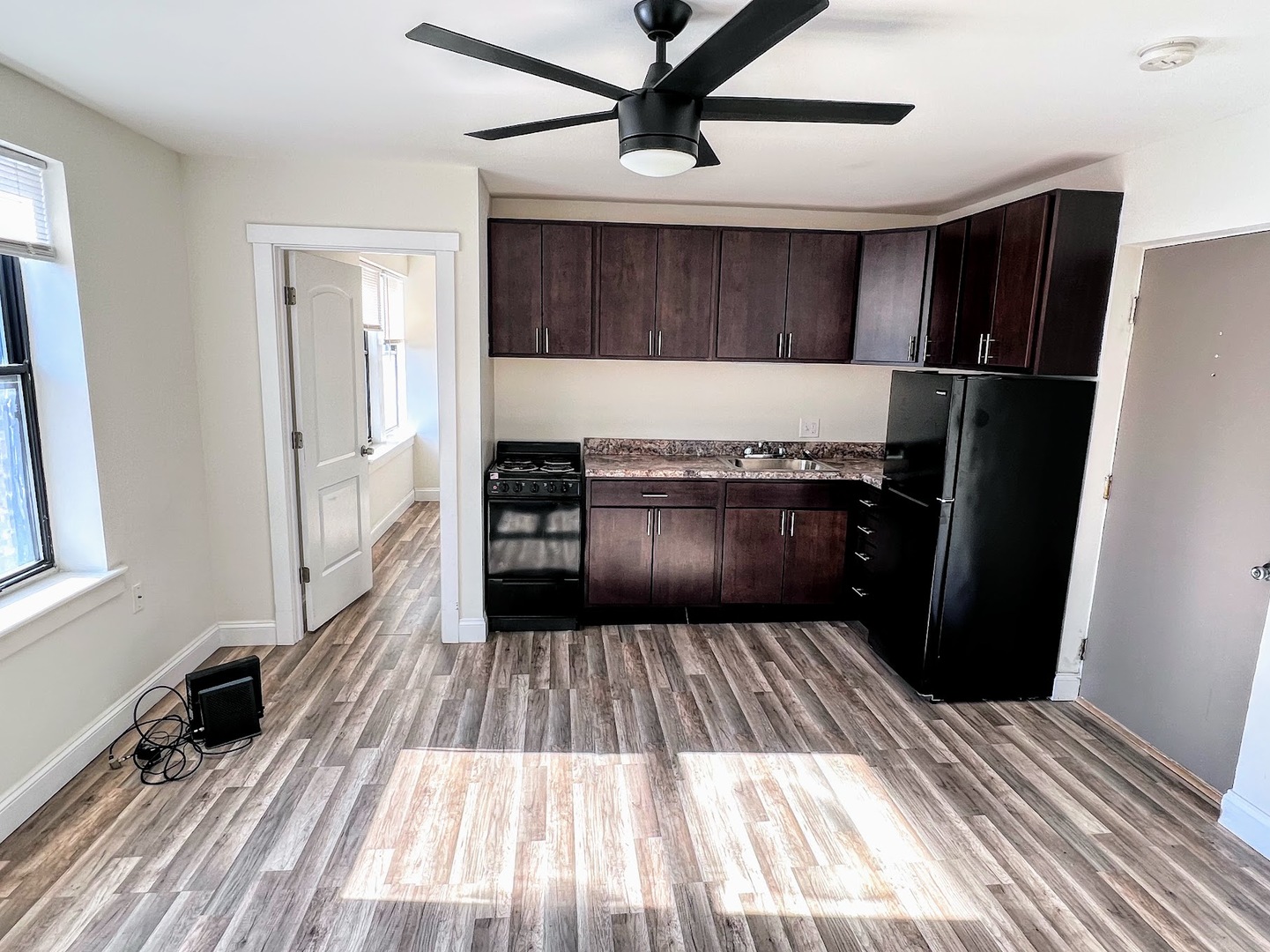 3933 North Clarendon Avenue, Unit 507 Chicago, IL 60613 - Photo 5 of 12 a view of a hardwood floor in a house
