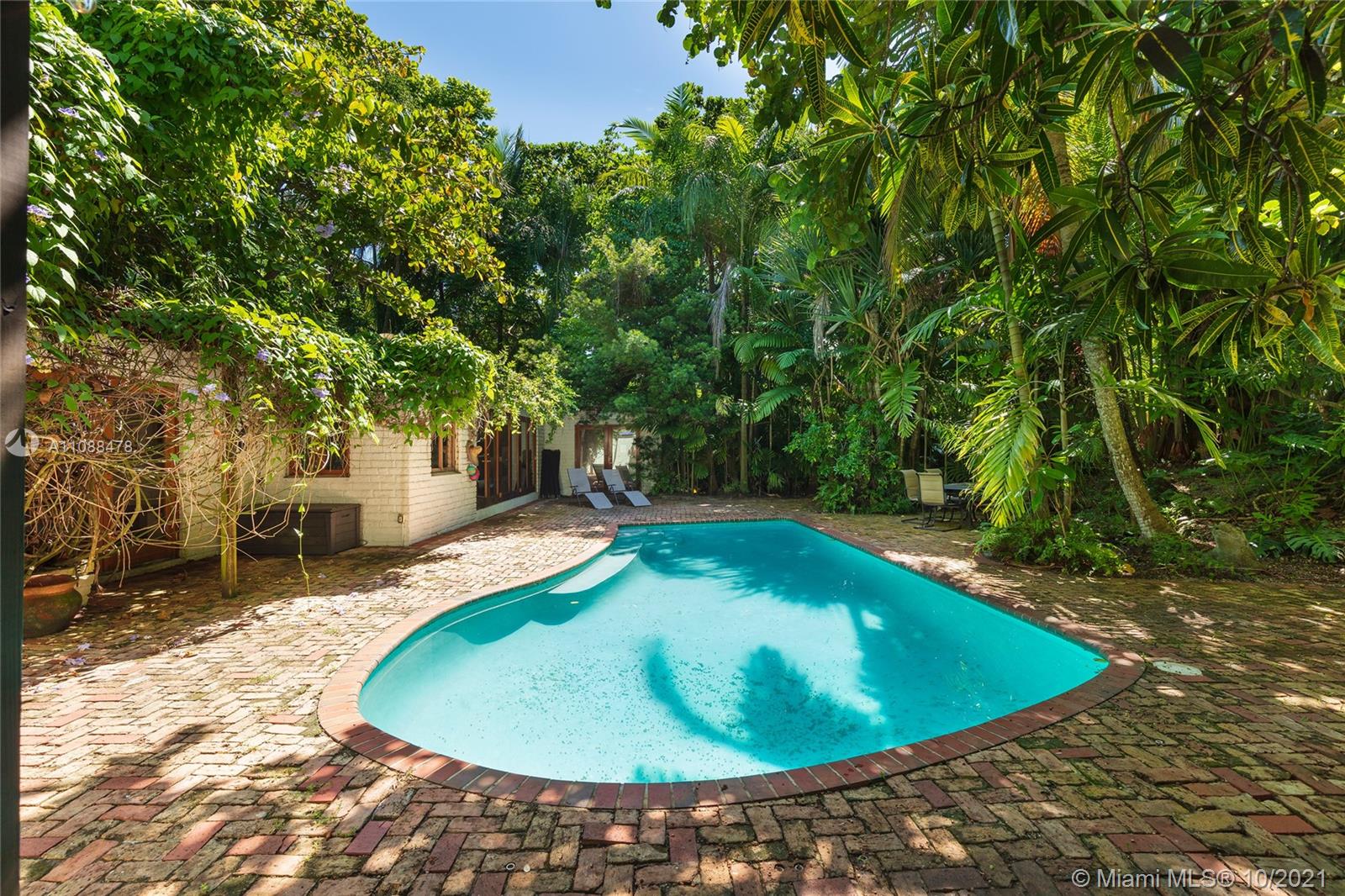 a view of a swimming pool with an outdoor space