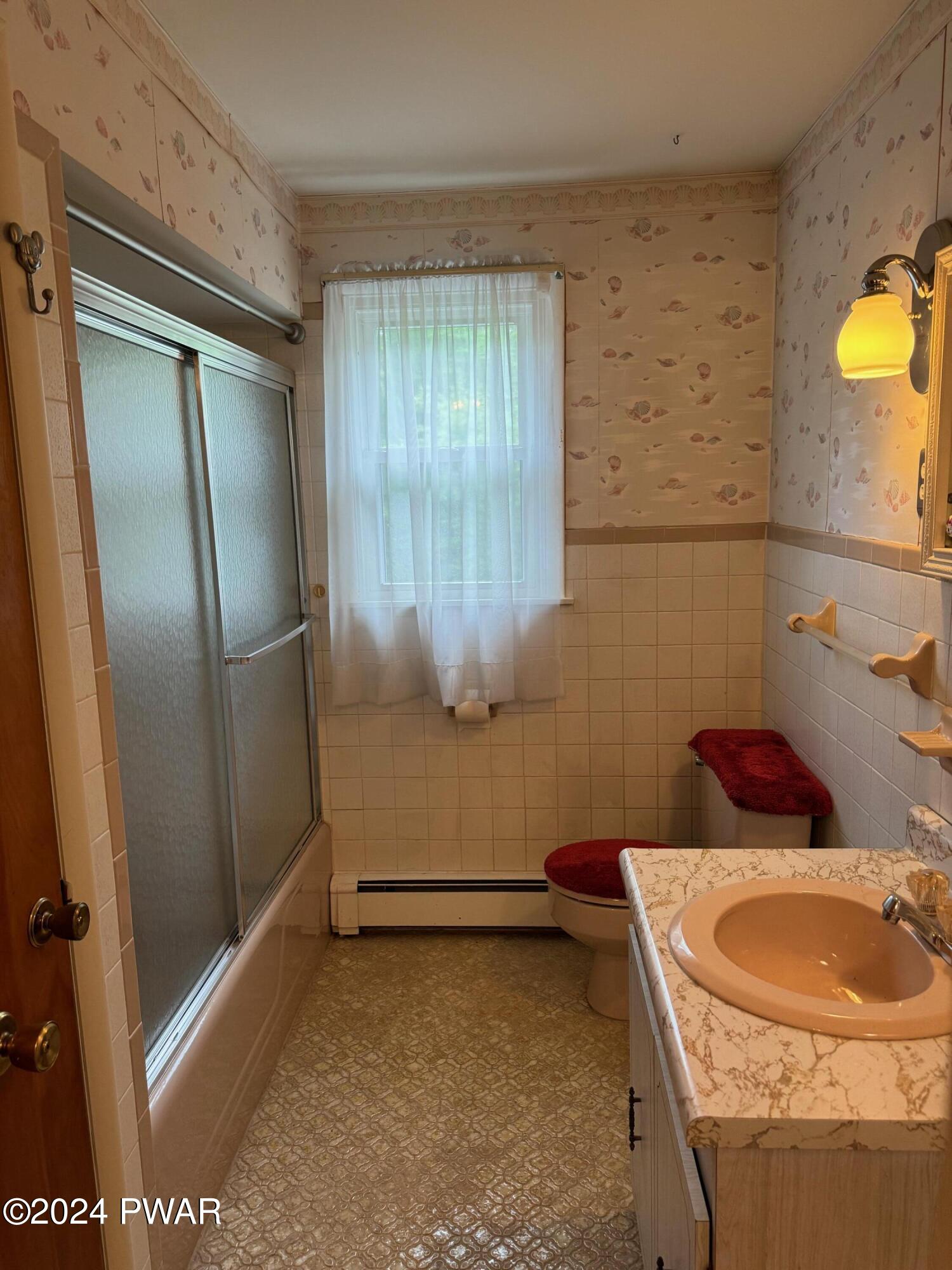 359 Canaan Road Waymart, PA 18472 - Photo 23 of 32 a bathroom with a sink and a mirror
