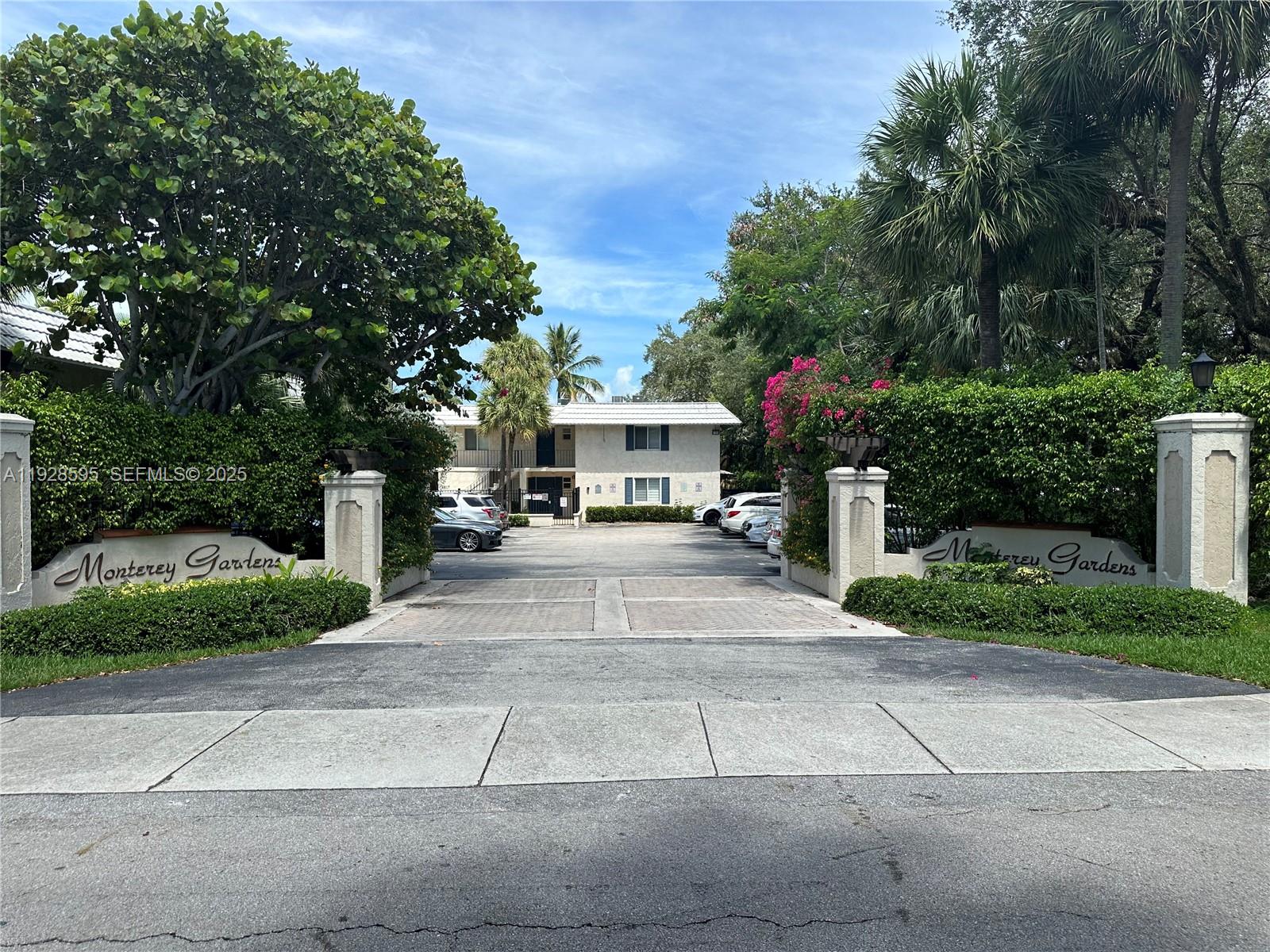 8603 Southwest 68th Court, Unit 26 Pinecrest, FL 33156 - Photo 11 of 13 a house view with a outdoor space
