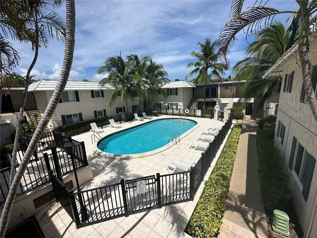 a view of a backyard with plants