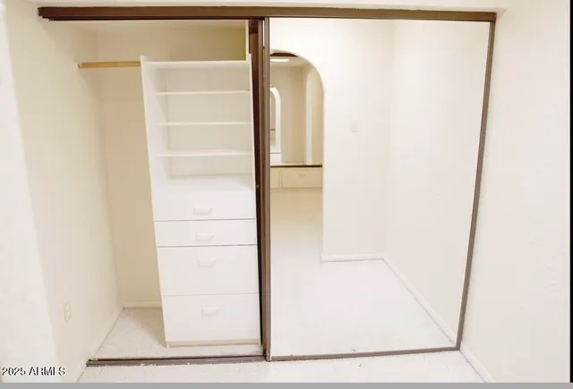 a view of swimming pool from a balcony