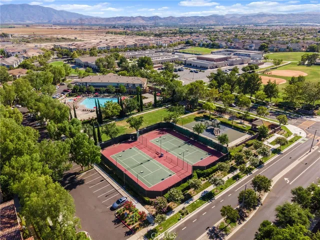 an aerial view of a pool patio and mountain view