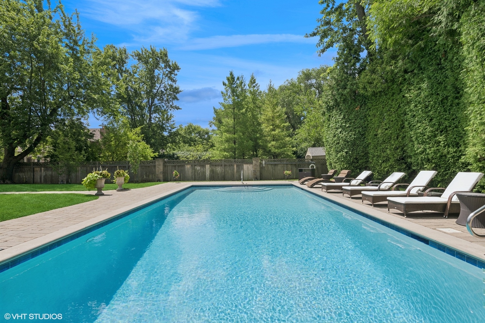 700 Greenwood Road Northbrook, IL 60062 - Photo 62 of 81 a view of a swimming pool with a lounge chair