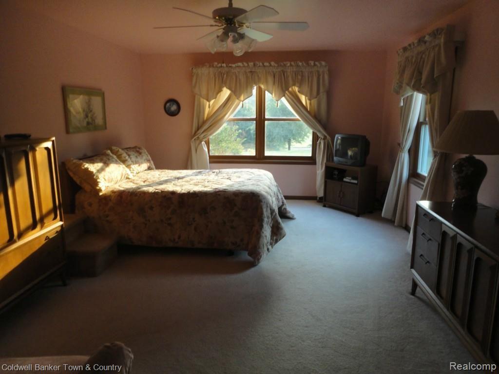7920 North Fleming Road Howell, MI 48855 - Photo 16 of 36 Master Bedroom