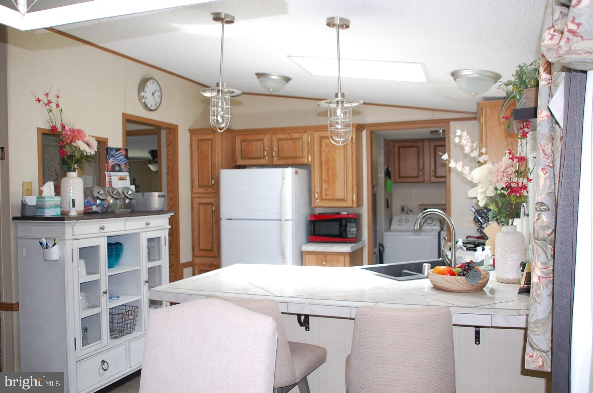 10505 Cedarville Road Brandywine, MD 20613 - Photo 17 of 36 View from Dining Area to More Kitchen