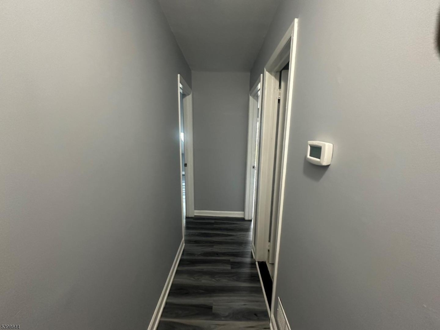 212 Village Commons Flemington, NJ 08822 - Photo 11 of 17 a view of a hallway with a elevator