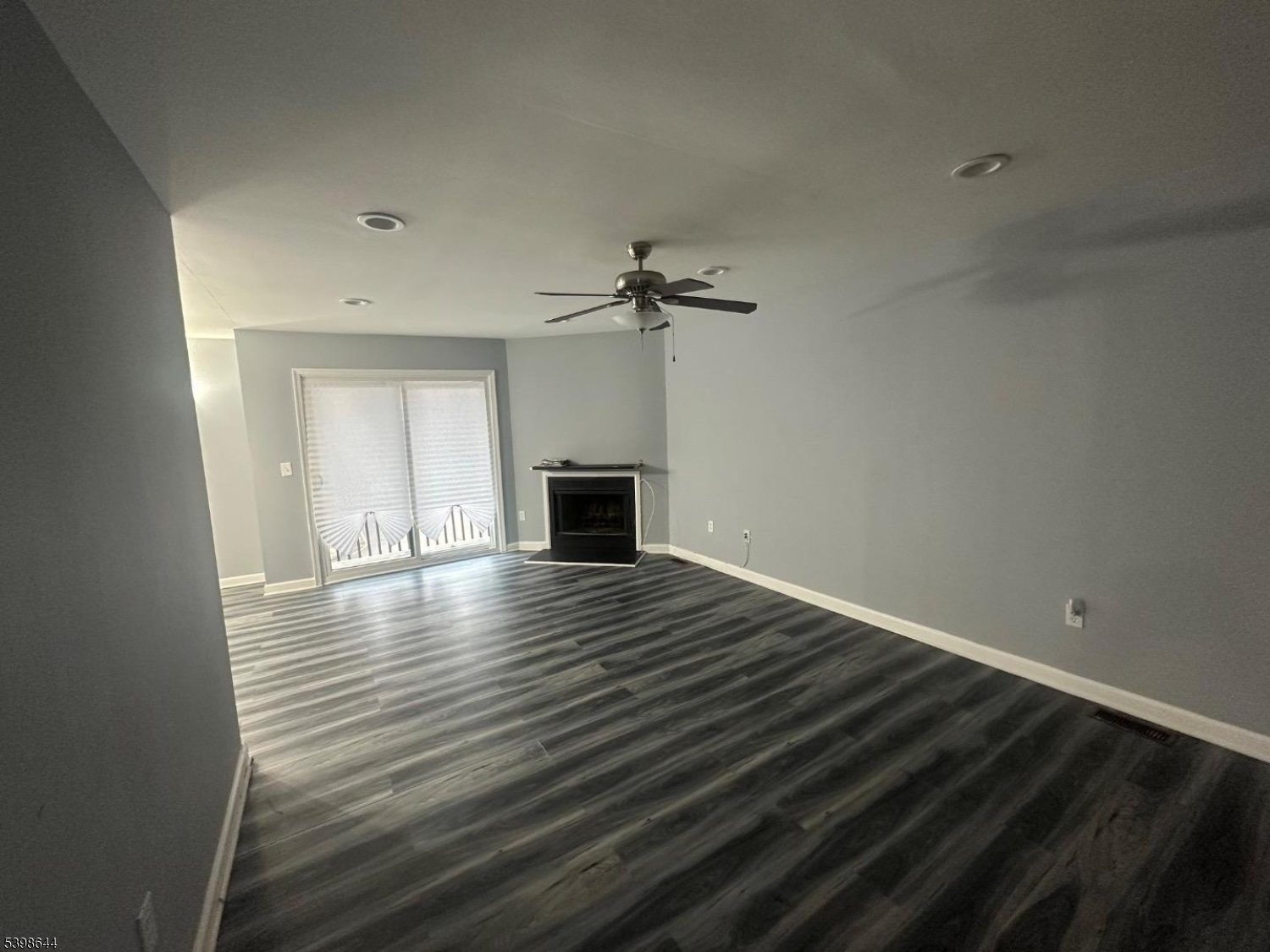 212 Village Commons Flemington, NJ 08822 - Photo 12 of 17 wooden floor in an empty room with a window