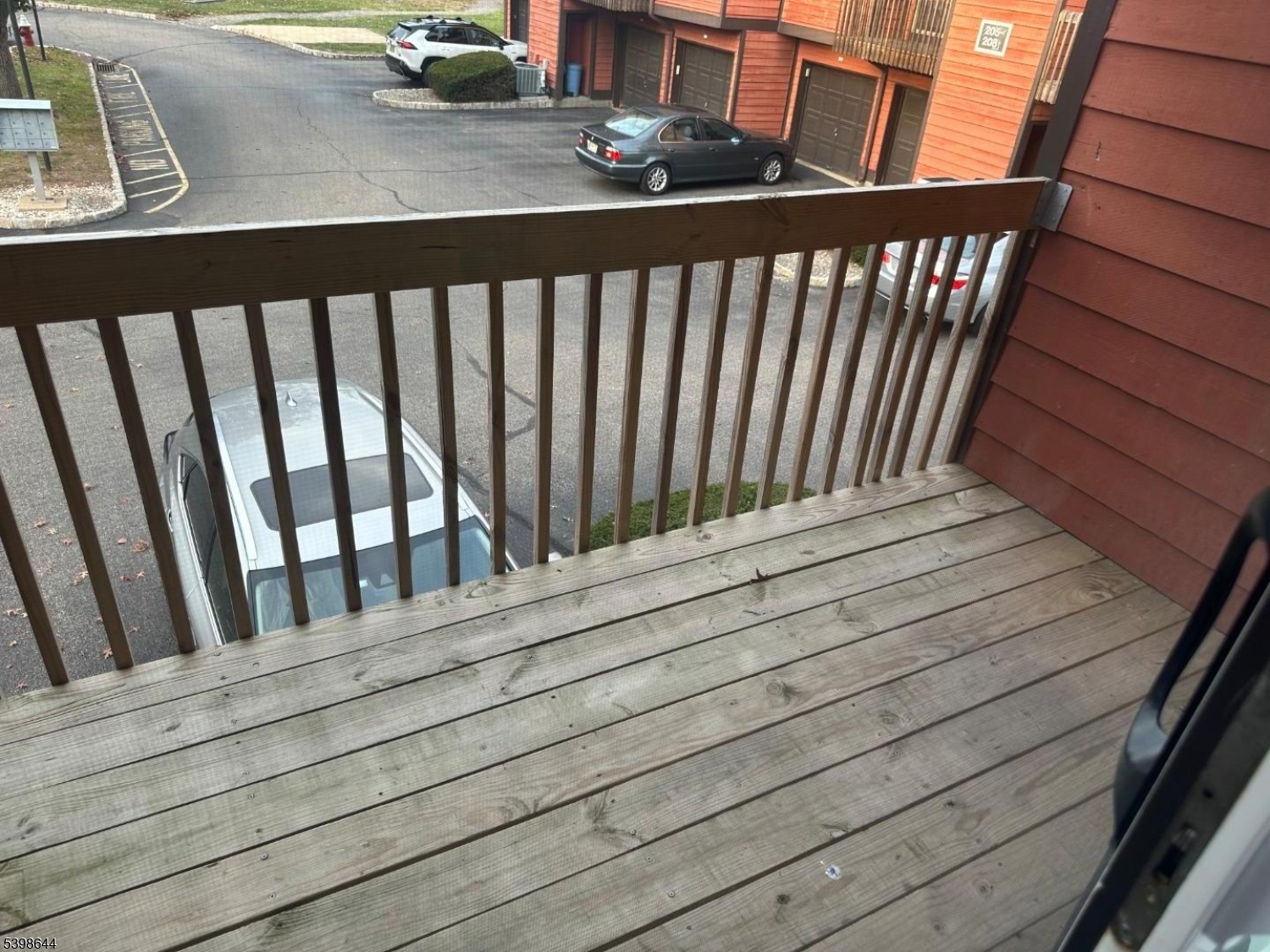 212 Village Commons Flemington, NJ 08822 - Photo 2 of 17 a view of wooden balcony