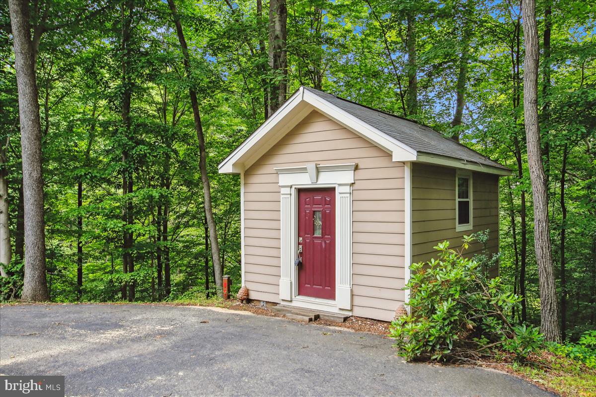 12221 Chapel Road Clifton, VA 20124 - Photo 79 of 93 Adorable Shed to House Your Lawn Tools.