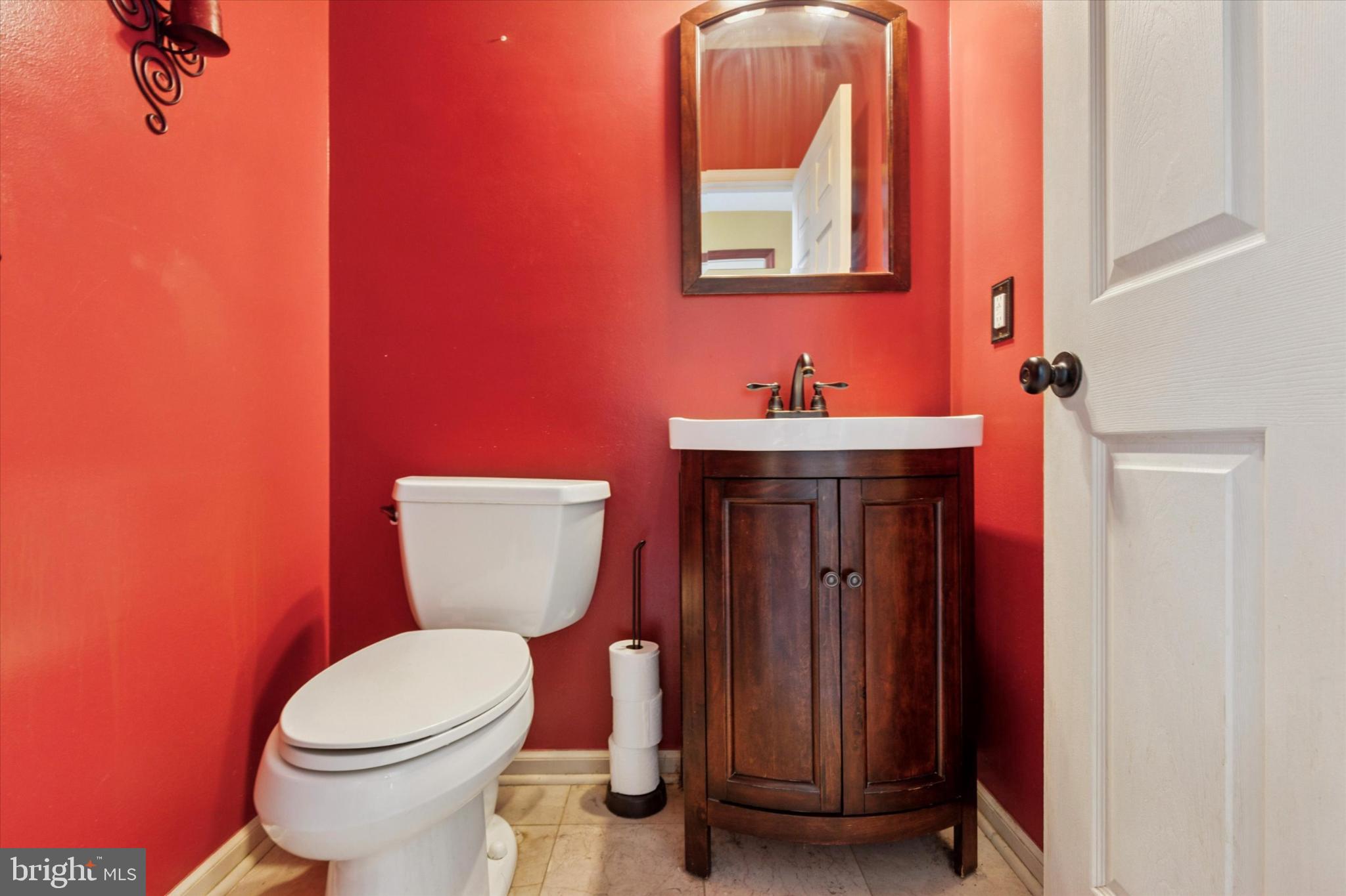 227 Beech Lane Perkasie, PA 18944 - Photo 15 of 34 Chic half-bath with bold red accents.