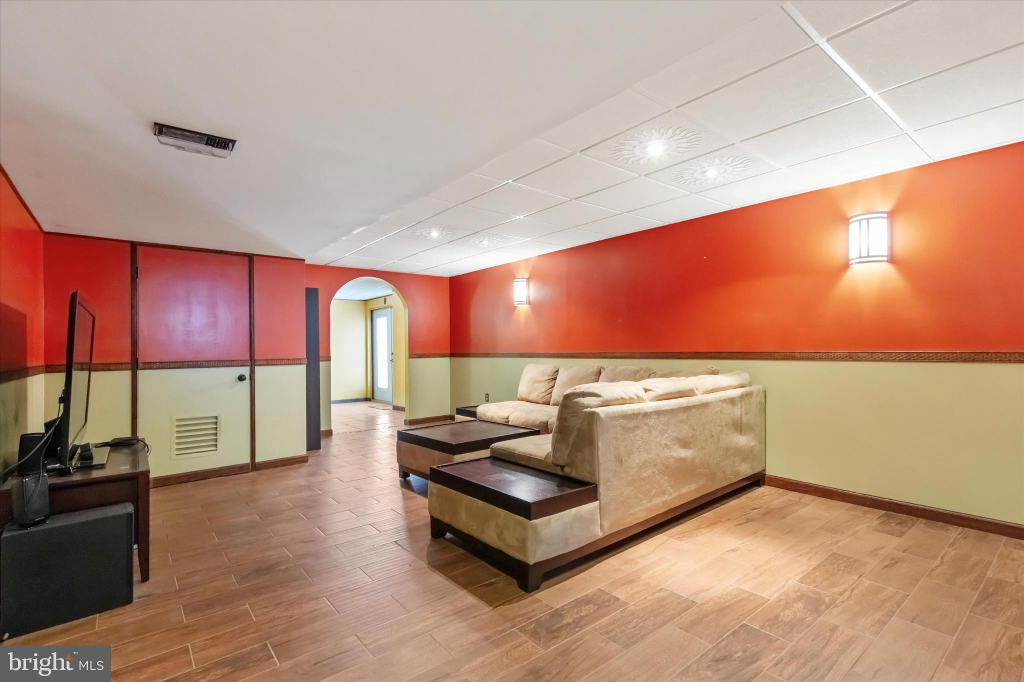 227 Beech Lane Perkasie, PA 18944 - Photo 28 of 34 Stylish basement retreat with vibrant accents.