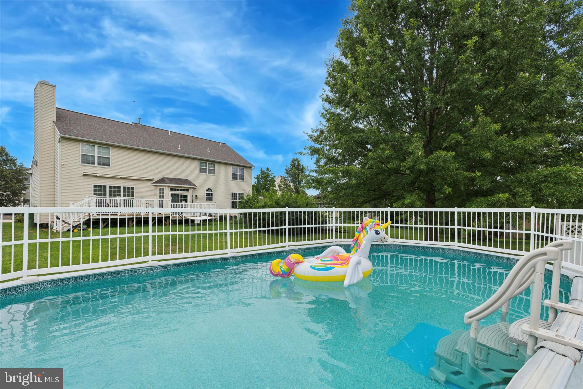 227 Beech Lane Perkasie, PA 18944 - Photo 3 of 34 Sunny backyard oasis with a refreshing pool.