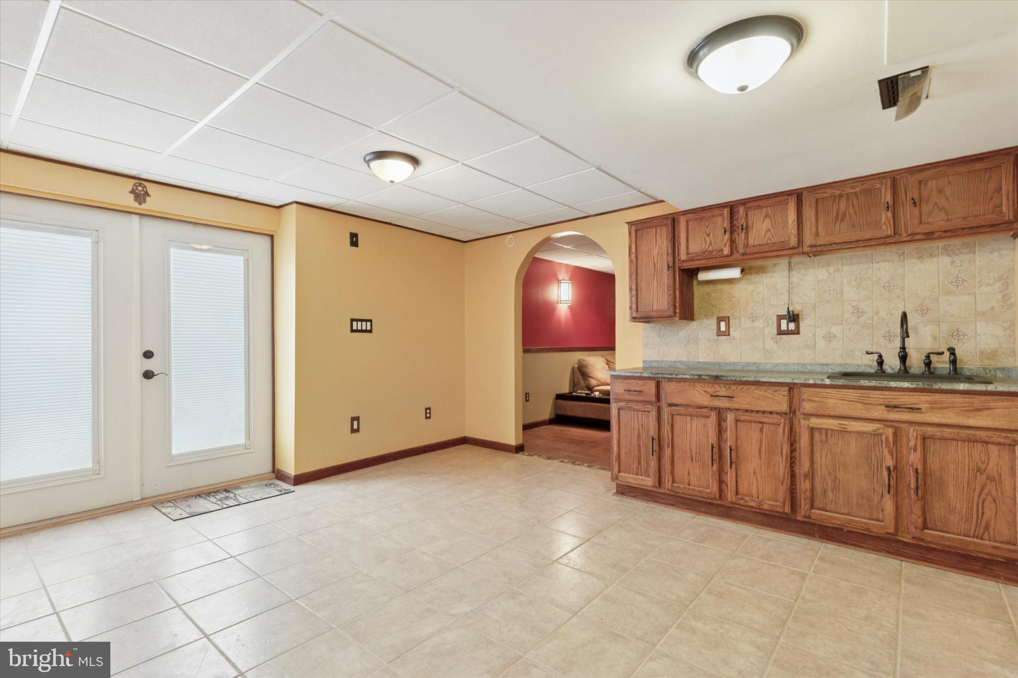 227 Beech Lane Perkasie, PA 18944 - Photo 31 of 34 Spacious kitchen with inviting natural light.