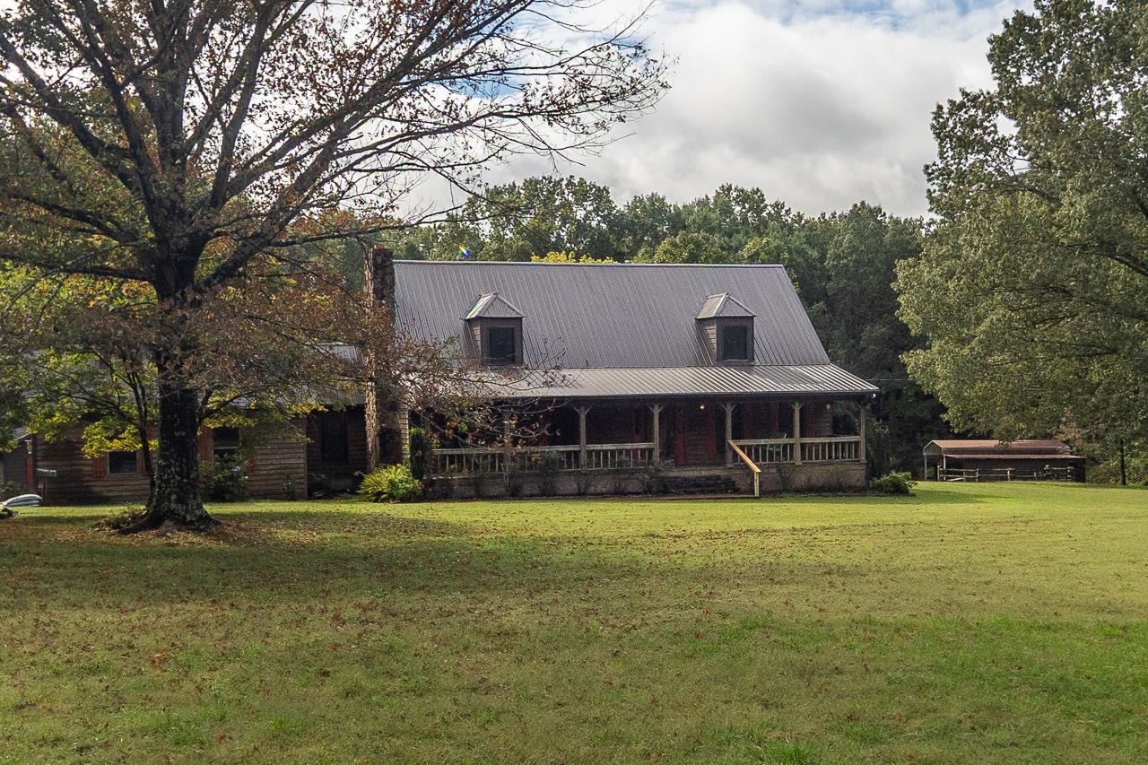 900 Center Point Drive Mason, TN 38049 - Photo 1 of 36 a view of a house with a big yard and large trees