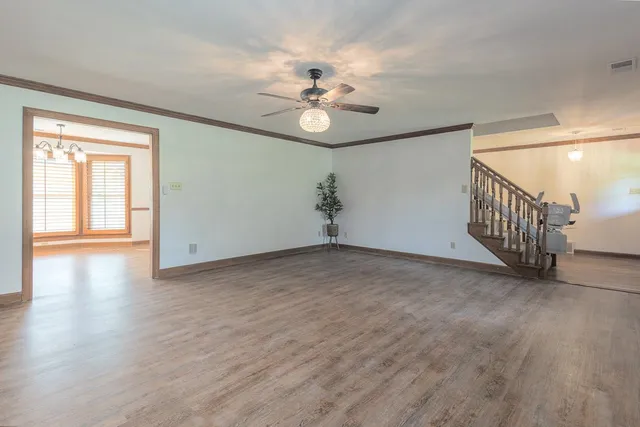 a view of a livingroom with a dishwasher cabinets and a kitchen