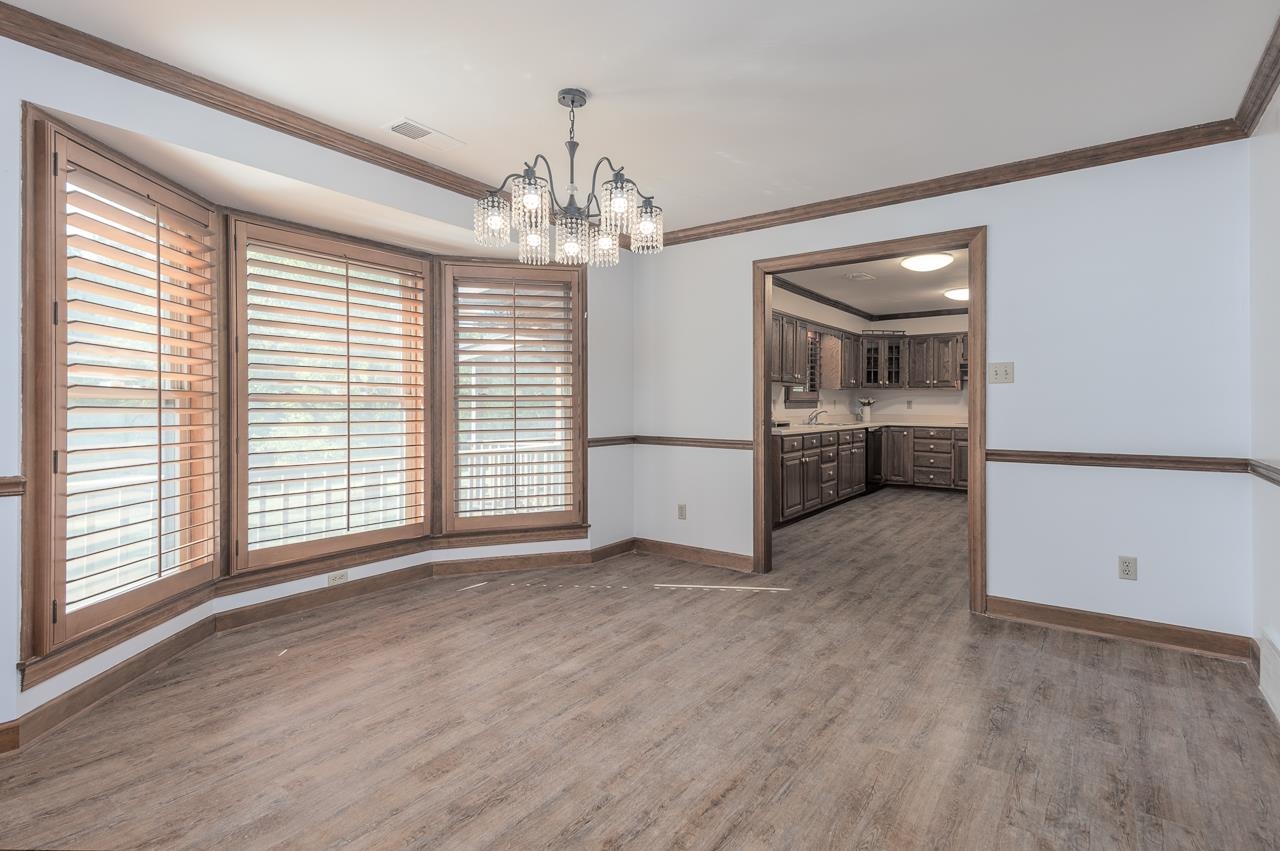 900 Center Point Drive Mason, TN 38049 - Photo 15 of 36 a view of a livingroom with a dishwasher cabinets and a kitchen