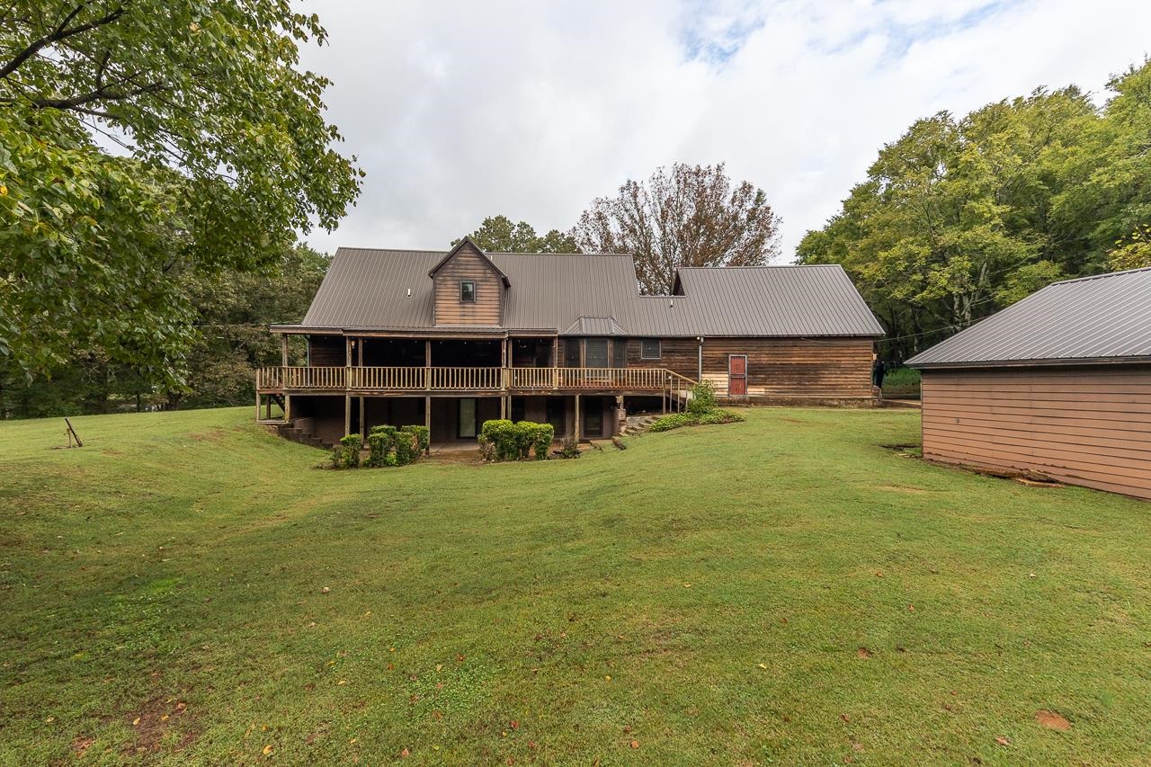 900 Center Point Drive Mason, TN 38049 - Photo 6 of 36 a front view of a house with a yard