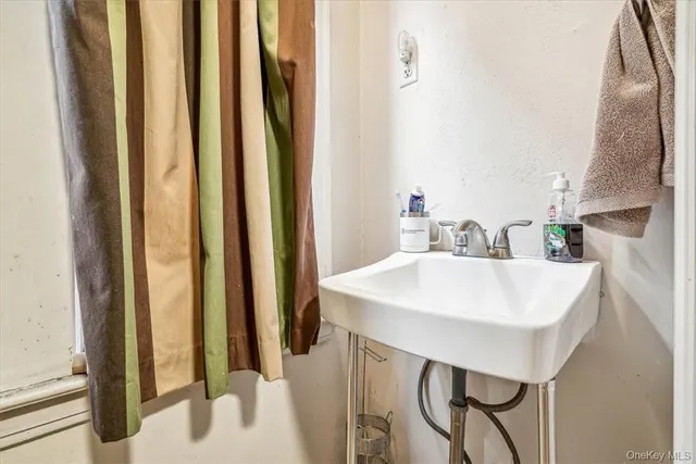 a kitchen with a table and chairs